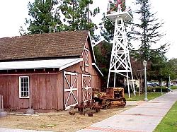farm equipment and barn in grape day park
