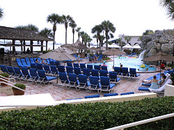 Pool, waterfall, bay view, tiki hut bar