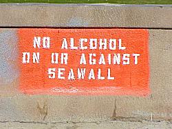no alcohol on or against seawall sign