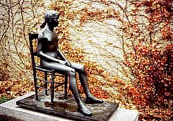 public art statue of seated girl