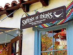 swings and things shop sign